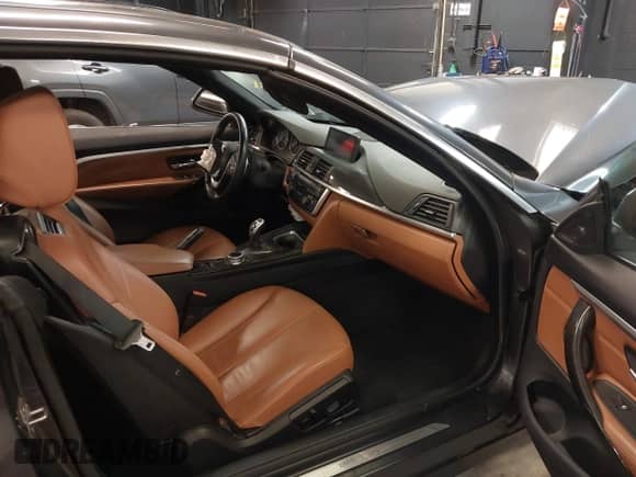 2014 BMW 4 Series 428i xDrive с VIN WBA3T1C59EPS98299, выставлен на аукционе IAAI как лот 41741235 с пробегом 93 000 миль миль и . История ставок и продаж доступна на DreamBid. Изображение 5.