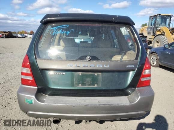 2004 Subaru Forester X with VIN JF1SG65674G701495, listed as a Copart auction lot 75701844 with 210,736 mi miles and Salvage title. Bid and sale history available at DreamBid. Image 6.