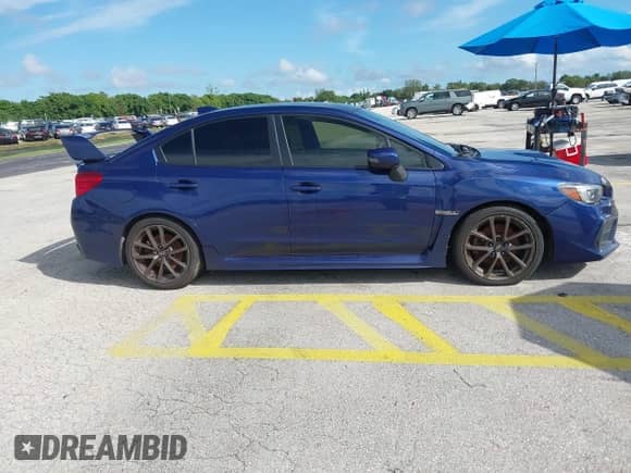2019 Subaru WRX Limited with VIN JF1VA1P65K8815775, listed as a IAAI auction lot 43289927 with 130,856 mi miles and . Bid and sale history available at DreamBid. Image 13.