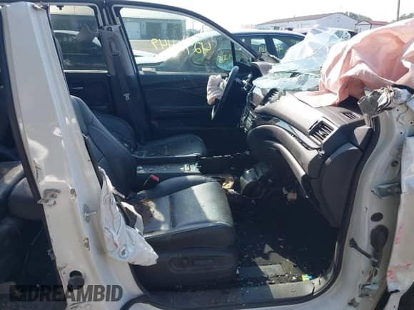 2022 Honda Pilot Elite with VIN 5FNYF6H02NB038959, listed as a IAAI auction lot 42786449 with 110,828 mi miles and . Bid and sale history available at DreamBid. Image 5.