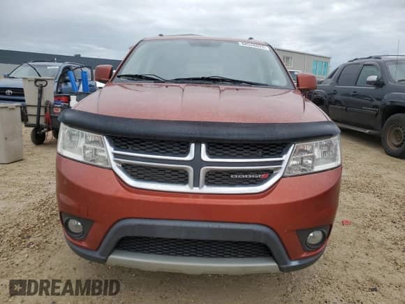 2013 Dodge Journey SXT с VIN 3C4PDCCG8DT581933, выставлен на аукционе Copart как лот 68526025 с пробегом 224 977 миль миль и Списание • Salvage title. История ставок и продаж доступна на DreamBid. Изображение 5.