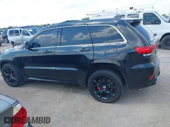 2014 Jeep Grand Cherokee SRT-8 с VIN 1C4RJFDJ4EC184701, выставлен на аукционе IAAI как лот 42924089 с пробегом 138 137 миль миль и . История ставок и продаж доступна на DreamBid. Изображение 14.