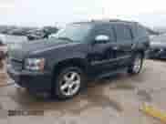 2014 Chevrolet Tahoe LTZ with VIN 1GNSCCE04ER141920, listed as a IAAI auction lot 41484239 with 98,855 mi miles and . Bid and sale history available at DreamBid. Image 2.