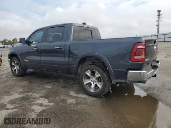 2019 Ram 1500 Laramie с VIN 1C6RREJTXKN884836, выставлен на аукционе Copart как лот 81023485 с пробегом 163 932 миль миль и Списание • Salvage title. История ставок и продаж доступна на DreamBid. Изображение 2.
