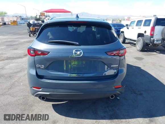 2022 Mazda CX-5 S Preferred z VIN JM3KFBCM2N1565165, wystawiony jako IAAI lot #42507203 z przebiegiem 39 853 mil mil oraz . Historia ofert i sprzedaży dostępna na DreamBid. Obrazek 17.