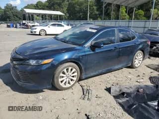 2019 Toyota Camry LE с VIN 4T1B11HK6KU842124, выставлен на аукционе Copart как лот 83793575 с пробегом 194 095 миль миль и Списание • Salvage title. История ставок и продаж доступна на DreamBid. Изображение 1.