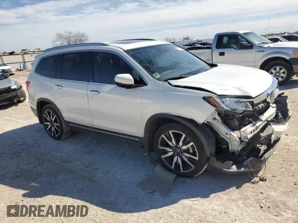 2020 Honda Pilot Touring 7-Passenger z VIN 5FNYF5H67LB021988, wystawiony jako Copart lot #47211215 z przebiegiem 99 698 mil mil oraz Szkoda całkowita • Salvage title. Historia ofert i sprzedaży dostępna na DreamBid. Obrazek 4.