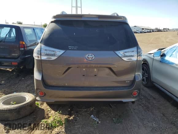 2015 Toyota Sienna SE with VIN 5TDXK3DC5FS642718, listed as a Copart auction lot 57339825 with 66,969 mi miles and Salvage title. Bid and sale history available at DreamBid. Image 6.