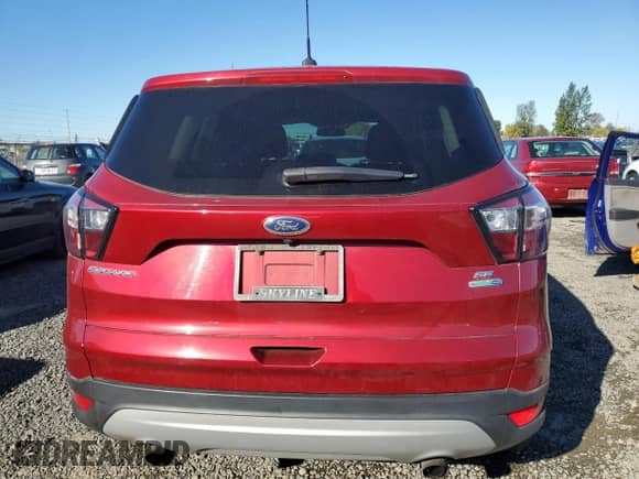 2017 Ford Escape SE with VIN 1FMCU9GD3HUF09112, listed as a Copart auction lot 86648605 with 60,865 mi miles and Clean title. Bid and sale history available at DreamBid. Image 6.