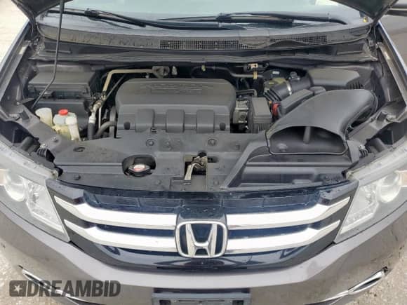 2015 Honda Odyssey Touring Elite с VIN 5FNRL5H96FB082857, выставлен на аукционе Copart как лот 59637105 с пробегом 187 947 миль миль и Списание • Salvage title. История ставок и продаж доступна на DreamBid. Изображение 12.