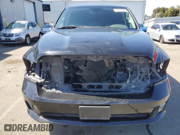 2013 Ram 1500 Tradesman z VIN 1C6RR6FT9DS716866, wystawiony jako Copart lot #51457845 z przebiegiem Nie podano mil oraz Szkoda całkowita • Salvage title. Historia ofert i sprzedaży dostępna na DreamBid. Obrazek 5.