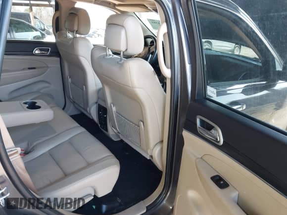2021 Jeep Grand Cherokee 80th Anniversary with VIN 1C4RJFBG1MC828760, listed as a IAAI auction lot 42029388 with 51,287 mi miles and . Bid and sale history available at DreamBid. Image 8.