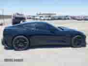 2014 Chevrolet Corvette Z51 3LT with VIN 1G1YM2D76E5105249, listed as a IAAI auction lot 42374805 with 60,472 mi miles and . Bid and sale history available at DreamBid. Image 13.