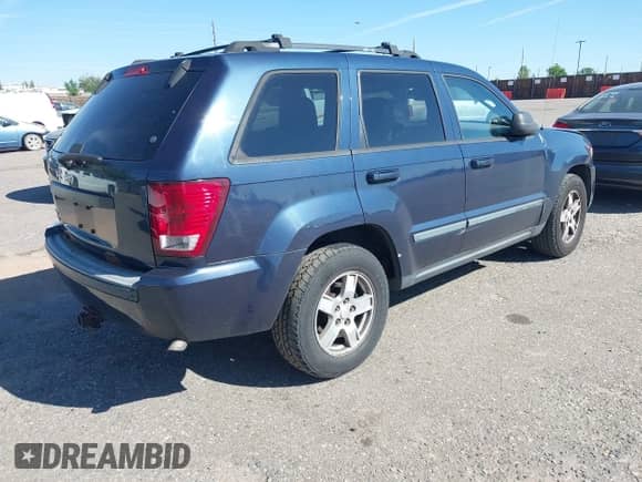 2009 Jeep Grand Cherokee Laredo with VIN 1J8GR48K89C549788, listed as a IAAI auction lot 42647567 with 206,358 mi miles and . Bid and sale history available at DreamBid. Image 4.