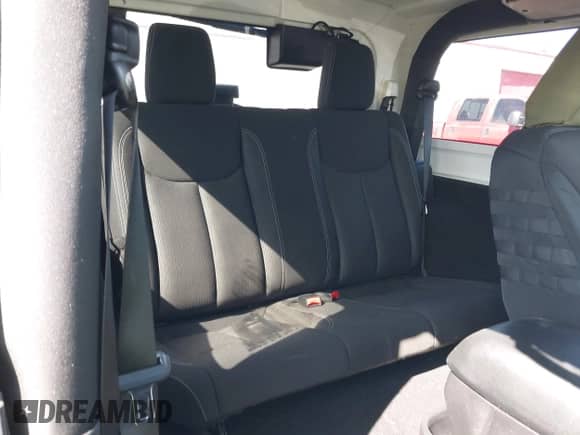 2015 Jeep Wrangler Rubicon Hard Rock z VIN 1C4BJWCGXFL771669, wystawiony jako IAAI lot #42057423 z przebiegiem 36 996 mil mil oraz . Historia ofert i sprzedaży dostępna na DreamBid. Obrazek 8.