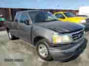 2003 Ford F-150 XL with VIN 1FTRX17223KB15935, listed as a Copart auction lot 70927245 with 167,265 mi miles and Salvage title. Bid and sale history available at DreamBid. Image 4.