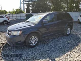 2013 Dodge Journey SXT with VIN 3C4PDCBB7DT608402, listed as a Copart auction lot 63580565 with 210,547 mi miles and Salvage title. Bid and sale history available at DreamBid. Image 1.