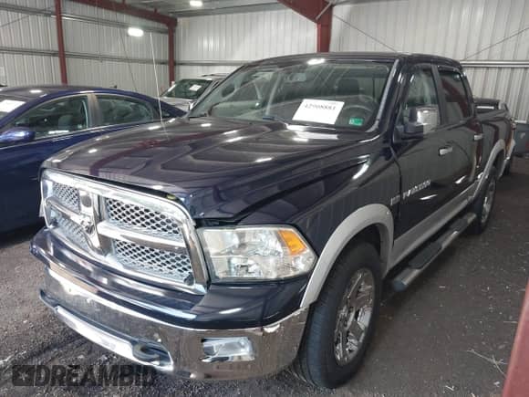 2012 Ram 1500 Laramie with VIN 1C6RD7NT5CS229782, listed as a IAAI auction lot 42908881 with 145,444 mi miles and . Bid and sale history available at DreamBid. Image 2.