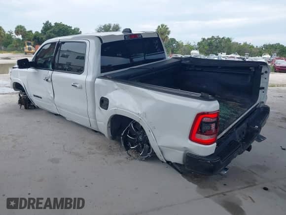 2020 Ram 1500 Longhorn with VIN 1C6SRFKT2LN414209, listed as a IAAI auction lot 42729994 with 70,390 mi miles and . Bid and sale history available at DreamBid. Image 3.
