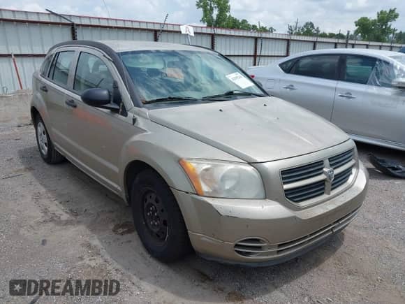 2009 Dodge Caliber SE with VIN 1B3HB28A49D152960, listed as a IAAI auction lot 42595261 with 168,166 mi miles and . Bid and sale history available at DreamBid. Image 1.