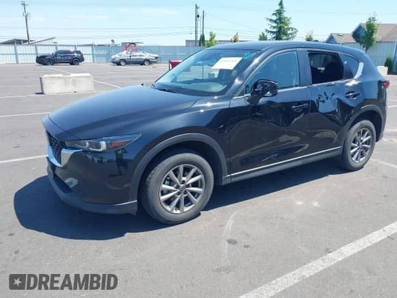 2023 Mazda CX-5 S Preferred z VIN JM3KFBCM1P0131456, wystawiony jako IAAI lot #42696205 z przebiegiem 65 060 mil mil oraz . Historia ofert i sprzedaży dostępna na DreamBid. Obrazek 2.