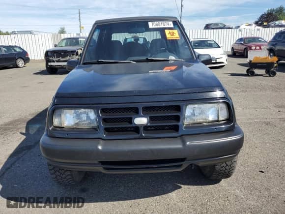 1998 Chevrolet Tracker с VIN 2CNBJ1868W6925819, выставлен на аукционе Copart как лот 70881874 с пробегом 180 849 миль миль и Списание • Salvage title. История ставок и продаж доступна на DreamBid. Изображение 5.