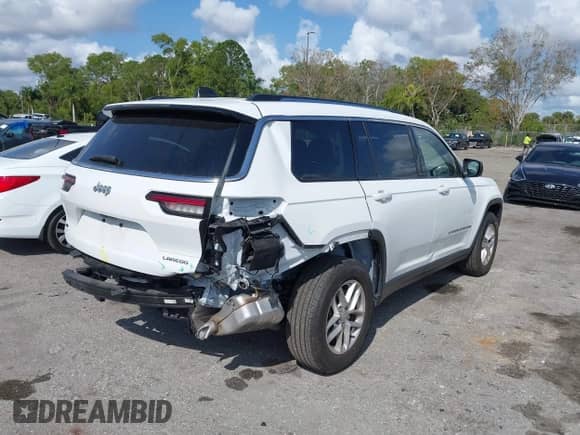 2023 Jeep Grand Cherokee Laredo z VIN 1C4RJJAG8P8790570, wystawiony jako IAAI lot #41490522 z przebiegiem 29 176 mil mil oraz . Historia ofert i sprzedaży dostępna na DreamBid. Obrazek 4.