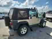 2003 Jeep Wrangler Rubicon с VIN 1J4FA69S13P310131, выставлен на аукционе Copart как лот 59139025 с пробегом 260 349 миль миль и Списание • Salvage title. История ставок и продаж доступна на DreamBid. Изображение 3.