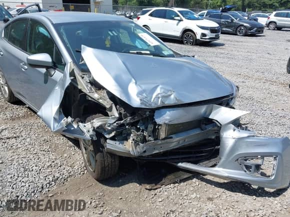 2018 Subaru Impreza Premium with VIN 4S3GKAB6XJ3600346, listed as a IAAI auction lot 42971470 with 56,291 mi miles and . Bid and sale history available at DreamBid. Image 6.