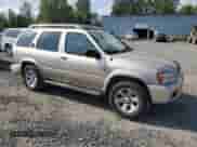 2002 Nissan Pathfinder SE with VIN JN8DR09Y92W737220, listed as a Copart auction lot 67274635 with 180,316 mi miles and Salvage title. Bid and sale history available at DreamBid. Image 4.