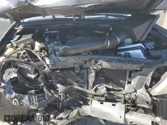 2012 Nissan Frontier SV z VIN 1N6AD0CU4CC443842, wystawiony jako Copart lot #49823795 z przebiegiem 167 703 mil mil oraz Szkoda całkowita • Salvage title. Historia ofert i sprzedaży dostępna na DreamBid. Obrazek 12.