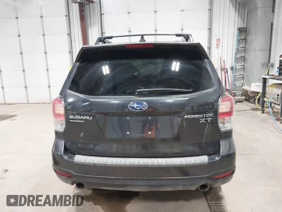 2018 Subaru Forester Premium with VIN JF2SJGEC2JH604459, listed as a IAAI auction lot 42514080 with 127,218 mi miles and . Bid and sale history available at DreamBid. Image 16.