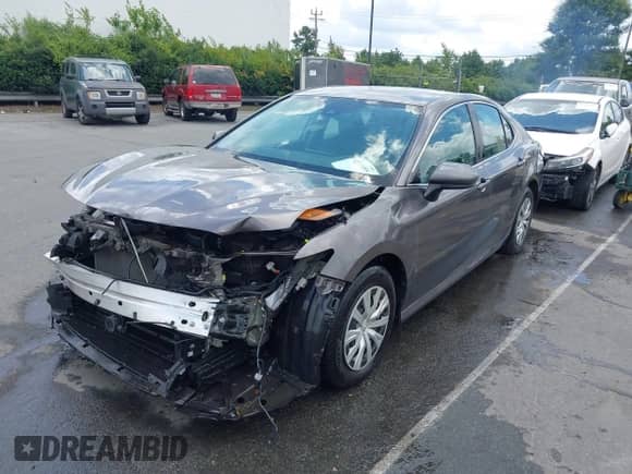 2022 Toyota Camry Hybrid LE with VIN 4T1C31AK9NU036999, listed as a IAAI auction lot 42741455 with 68,970 mi miles and . Bid and sale history available at DreamBid. Image 19.