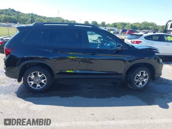 2023 Honda Passport TrailSport с VIN 5FNYF8H64PB033801, выставлен на аукционе IAAI как лот 43140933 с пробегом 38 095 миль миль и . История ставок и продаж доступна на DreamBid. Изображение 14.