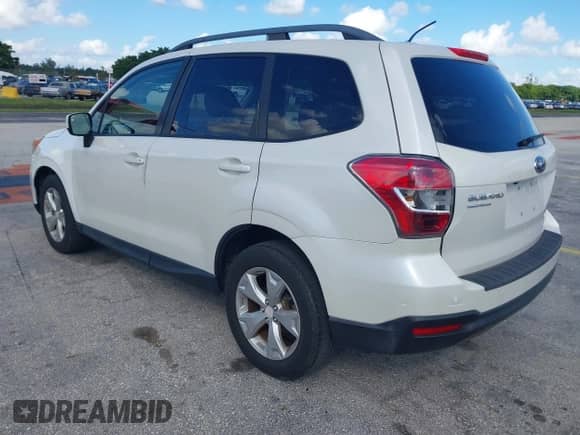 2014 Subaru Forester Premium with VIN JF2SJAEC1EH493227, listed as a IAAI auction lot 43534322 with 40,546 mi miles and . Bid and sale history available at DreamBid. Image 3.