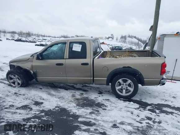 2008 Dodge 1500 SLT with VIN 1D7HU18N48J240080, listed as a IAAI auction lot 41237330 with 228,336 mi miles and . Bid and sale history available at DreamBid. Image 14.