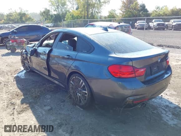 2016 BMW 4 Series 428i z VIN WBA4A9C55GGL87475, wystawiony jako IAAI lot #43233792 z przebiegiem 70 137 mil mil oraz . Historia ofert i sprzedaży dostępna na DreamBid. Obrazek 3.