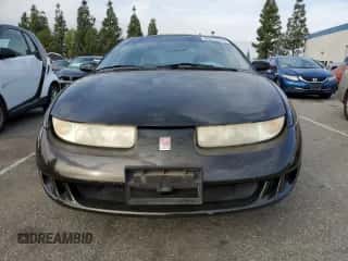1997 Saturn SC with VIN 1G8ZF1286VZ350275, listed as a Copart auction lot 83010514 with 143,241 mi miles and Salvage title. Bid and sale history available at DreamBid. Image 5.