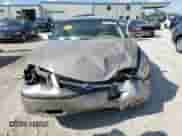 2001 Chevrolet Impala с VIN 2G1WF55E519357152, выставлен на аукционе Copart как лот 69871285 с пробегом Не указан миль и Списание • Salvage title. История ставок и продаж доступна на DreamBid. Изображение 5.