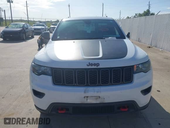 2017 Jeep Grand Cherokee Trailhawk z VIN 1C4RJFLT0HC875456, wystawiony jako IAAI lot #42695042 z przebiegiem 98 879 mil mil oraz . Historia ofert i sprzedaży dostępna na DreamBid. Obrazek 12.