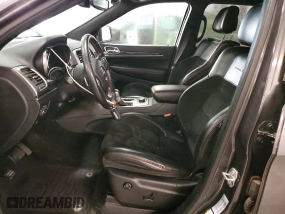 2017 Jeep Grand Cherokee Trailhawk z VIN 1C4RJFLG0HC610281, wystawiony jako Copart lot #82325495 z przebiegiem 140 671 mil mil oraz Czysty tytuł • Clean title. Historia ofert i sprzedaży dostępna na DreamBid. Obrazek 7.