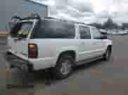 2004 Chevrolet Suburban LT z VIN 1GNFK16Z94J130902, wystawiony jako Copart lot #68551464 z przebiegiem 253 835 mil mil oraz Szkoda całkowita • Salvage title. Historia ofert i sprzedaży dostępna na DreamBid. Obrazek 3.