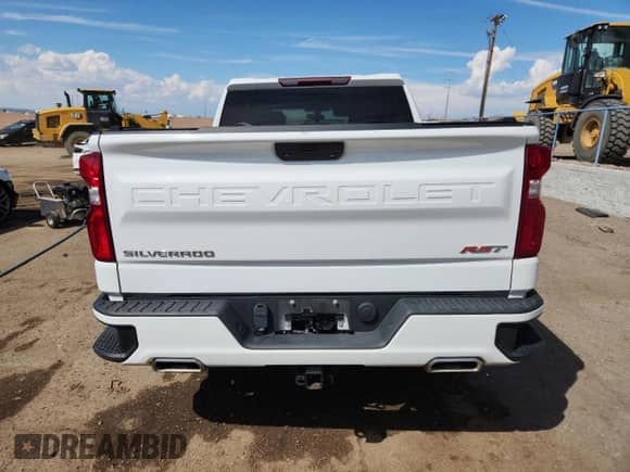 2021 Chevrolet Silverado 1500 RST with VIN 1GCUYEED3MZ353305, listed as a Copart auction lot 70902515 with 63,378 mi miles and Salvage title. Bid and sale history available at DreamBid. Image 6.