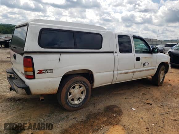 2005 GMC Sierra 1500 SLE z VIN 1GTEK19B85Z184567, wystawiony jako Copart lot #69142805 z przebiegiem Nie podano mil oraz Szkoda całkowita • Salvage title. Historia ofert i sprzedaży dostępna na DreamBid. Obrazek 3.