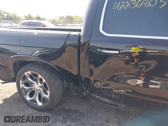 2020 Ram 1500 Longhorn with VIN 1C6SRFKT5LN117418, listed as a IAAI auction lot 42236803 with 96,338 mi miles and . Bid and sale history available at DreamBid. Image 6.