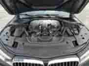 2016 BMW 7 Series 750i with VIN WBA7F0C53GGM20760, listed as a Copart auction lot 57230334 with 77,588 mi miles and Salvage title. Bid and sale history available at DreamBid. Image 11.