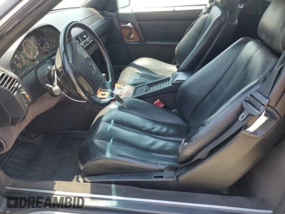 1992 Mercedes-Benz 500 z VIN WDBFA66E0NF040854, wystawiony jako Copart lot #63866875 z przebiegiem 144 606 mil mil oraz Szkoda całkowita • Salvage title. Historia ofert i sprzedaży dostępna na DreamBid. Obrazek 7.