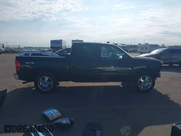 2013 Chevrolet Silverado 1500 LT with VIN 3GCPKSE70DG182214, listed as a IAAI auction lot 43087741 with 204,953 mi miles and . Bid and sale history available at DreamBid. Image 14.
