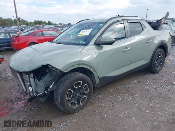 2023 Hyundai Santa Cruz SEL Premium z VIN 5NTJDDAF8PH057158, wystawiony jako IAAI lot #43297490 z przebiegiem 22 330 mil mil oraz . Historia ofert i sprzedaży dostępna na DreamBid. Obrazek 2.