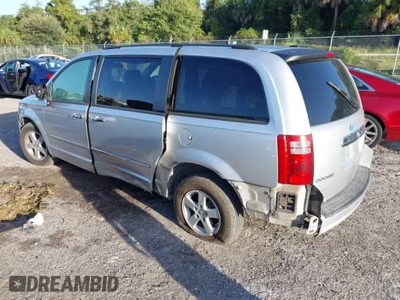 2010 Dodge Grand Caravan SXT with VIN 2D4RN5D11AR251628, listed as a IAAI auction lot 43350917 with 109,808 mi miles and . Bid and sale history available at DreamBid. Image 3.